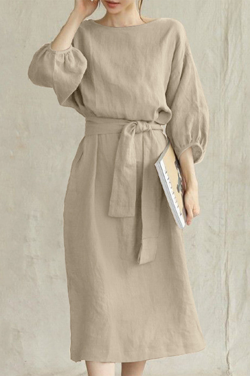 Flowy Bardot midi dress for women by FJØRNA, elegant and stylish, featuring a flowing fabric and off-shoulder design.