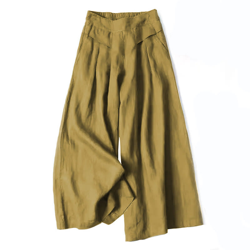 FJØRNA women's lightweight summer trousers with high waist, wide-leg fit, and front pockets, perfect for warm weather wear.