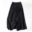 FJØRNA lightweight summer women's trousers with high waist, wide leg fit, and pockets, shown on a model.