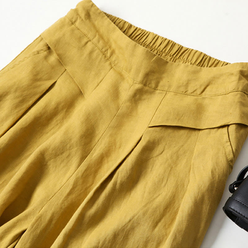 FJØRNA lightweight summer trousers for women with high waist, wide leg, and side pockets, casual and breathable for warm weather.