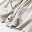 FJØRNA women's lightweight summer trousers with high waist, wide legs, and front pockets, perfect for warm-weather styling.