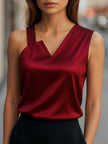 FJØRNA women's burgundy satin sleeveless blouse with asymmetric neckline, stylish top for women, elegant and modern design.