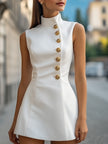 FJØRNA gold satin sheath dress with high collar and golden buttons, elegant evening dress with smooth satin finish.