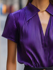 FJØRNA purple satin blouse for women with striped pattern, short sleeves, and wide collar, stylish women's top.