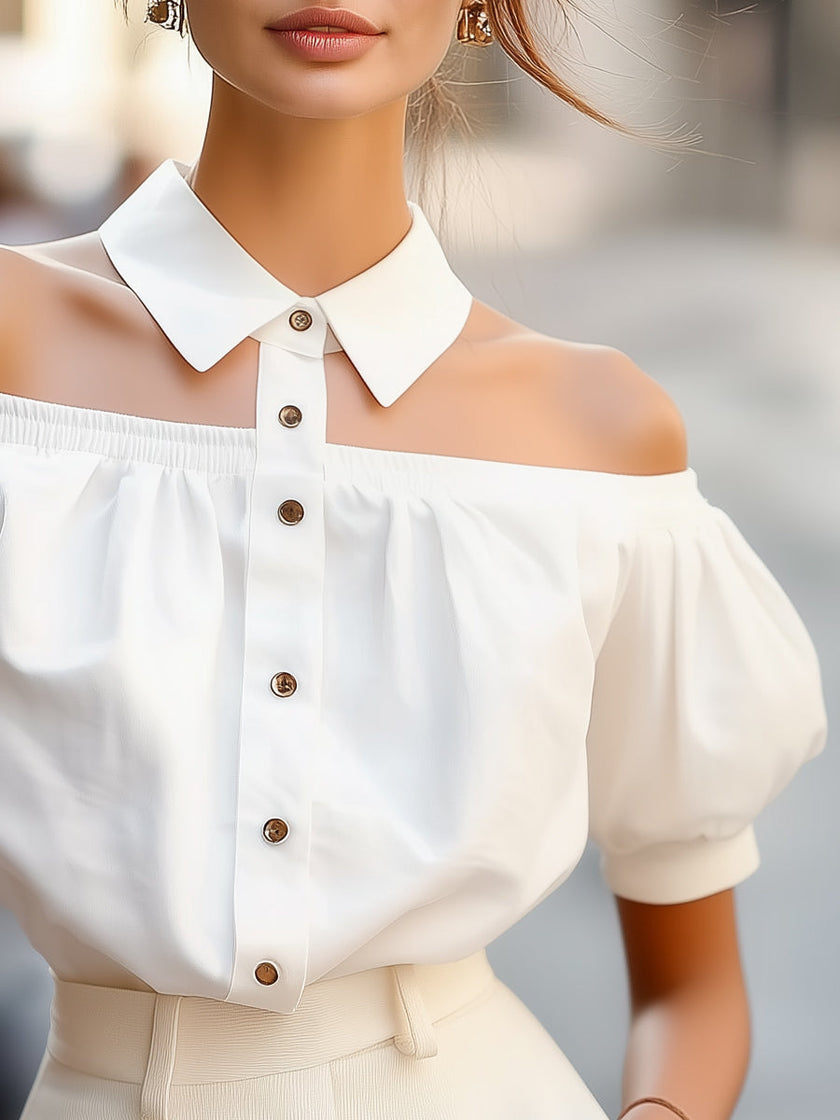 White off-shoulder blouse for women with puff sleeves, button-up front, and statement collar by FJØRNA.