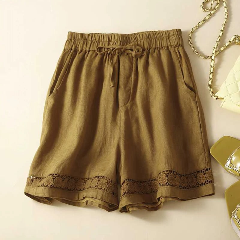 FJØRNA Rica™ Relaxed Floral Shorts with vibrant flower print and comfortable fit, perfect for casual summer wear.
