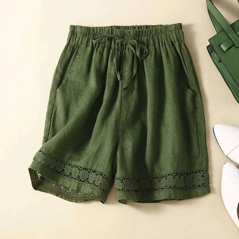 FJØRNA Rica™ Relaxed Floral Shorts with vibrant floral pattern, lightweight fabric, and comfortable fit for casual wear.
