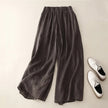 FJØRNA lightweight summer women's trousers with straight leg design, breathable and flowy fabric for comfortable wear.