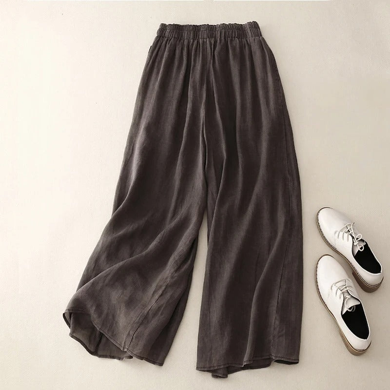 FJØRNA lightweight summer women's trousers with straight leg design, breathable and flowy fabric for comfortable wear.