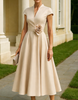 Red satin midi dress for women by FJØRNA featuring a V-neck, A-line silhouette, and floral design.