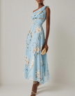 Light blue chiffon midi dress for women by FJØRNA featuring a one-shoulder design and floral pattern.