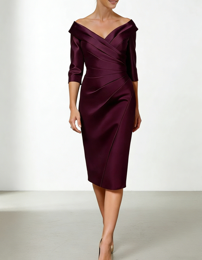 Red satin midi dress for women by FJØRNA featuring a bodycon fit and ruffle details, shown on a hanger.
