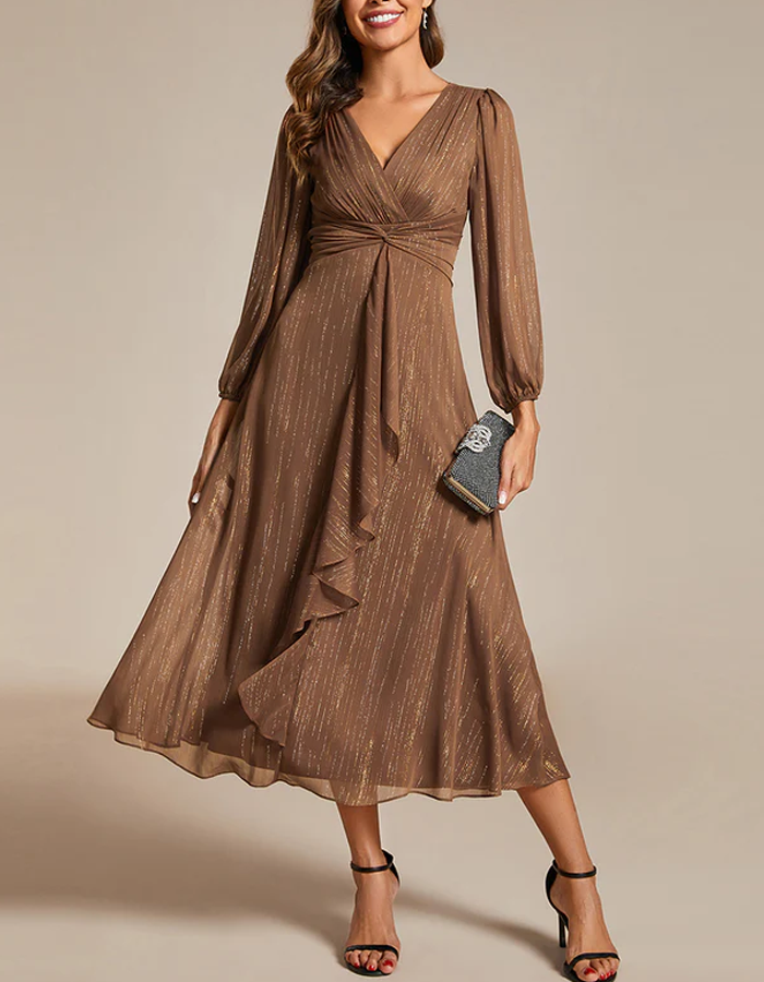 FJØRNA women's midi dress two-piece set featuring a stylish, flowy design with a fitted top and matching skirt.