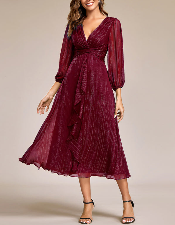 FJØRNA women's midi dress two-piece set featuring a flowy top and matching skirt, perfect for stylish daytime wear.