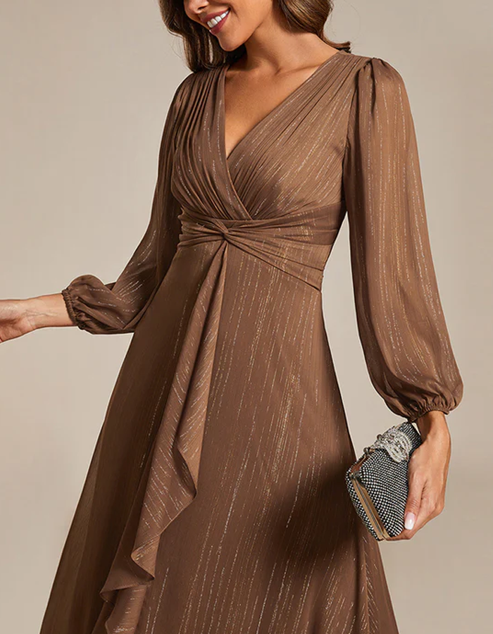 FJØRNA women's midi dress and two-piece set featuring a stylish, flowing design with a fitted top and matching skirt.