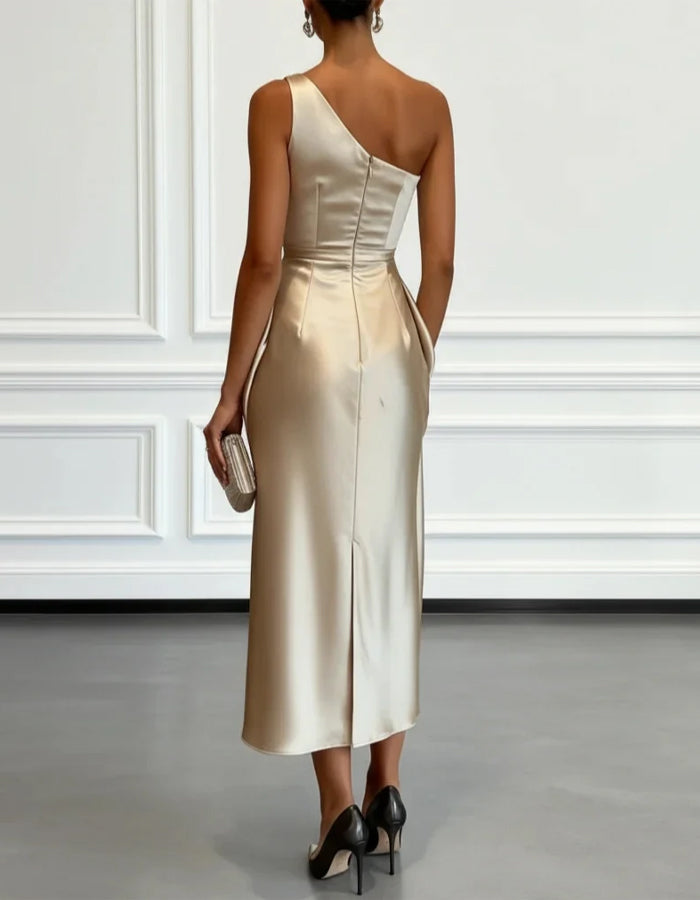 FJØRNA champagne satin midi dress for women with one-shoulder design and pleated details, elegant evening wear.