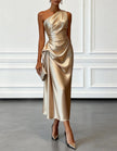 FJØRNA champagne satin midi dress for women, one-shoulder design with pleated details, elegant evening fashion.