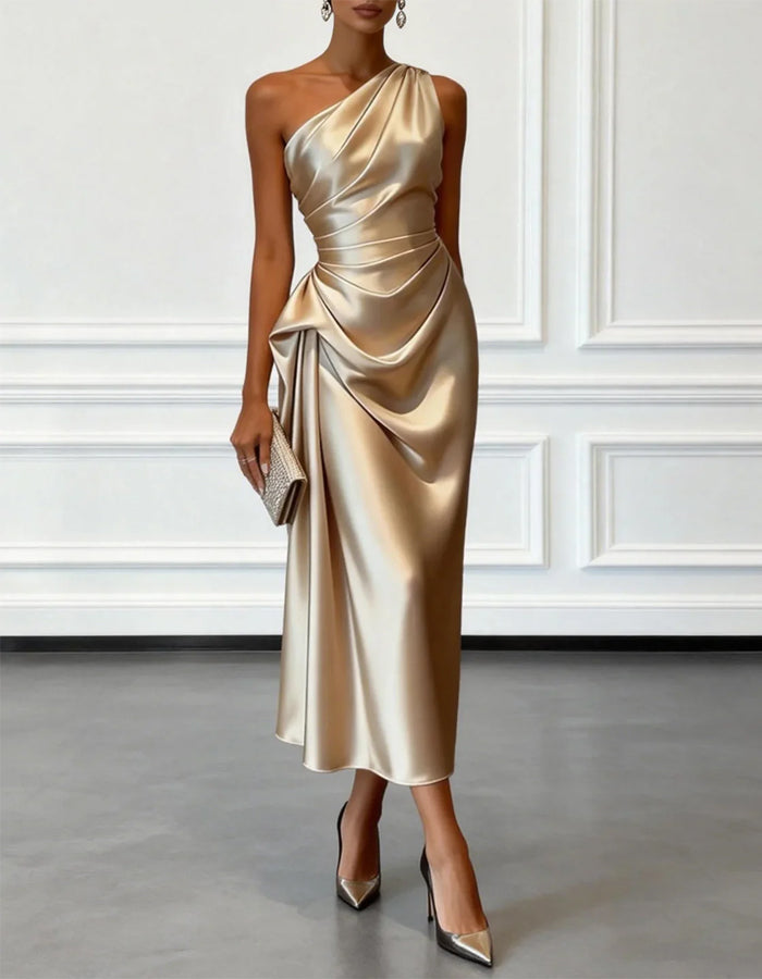 FJØRNA champagne satin midi dress for women, one-shoulder design with pleated details, elegant evening fashion.