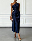 FJØRNA champagne satin midi dress for women with one-shoulder design and pleated details, elegant evening fashion.