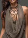 FJØRNA Earth tone double-layer mesh knit halter tank top displayed on a mannequin, showcasing its stylish design and fabric texture.