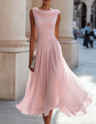 FJØRNA chiffon midi dress for women with draped neckline and pleated design, flowing fabric and elegant silhouette.