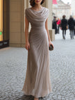FJØRNA draped cowl-neck ruched maxi dress featuring flowing fabric and elegant design, perfect for formal occasions.