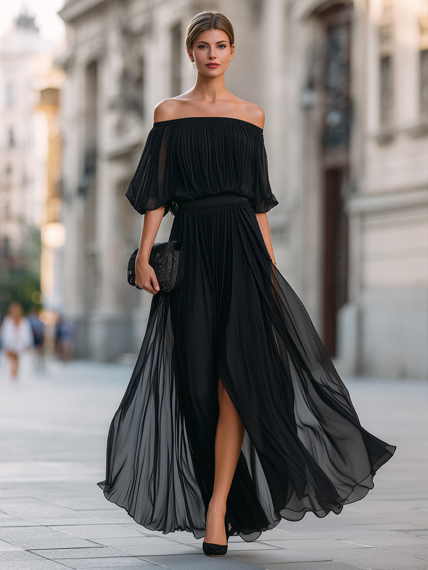 FJØRNA off-shoulder pleated chiffon maxi dress with flowing fabric and elegant design, suitable for formal occasions.