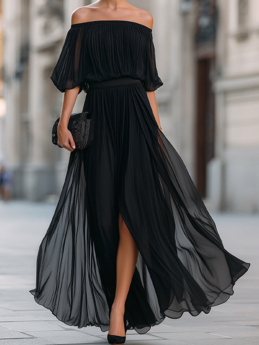FJØRNA off-shoulder pleated chiffon maxi dress with flowy fabric and elegant design, suitable for formal occasions.