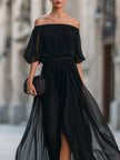 FJØRNA off-shoulder pleated chiffon maxi dress with flowing fabric and elegant design, perfect for formal occasions.