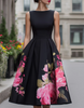 FJØRNA black floral printed sleeveless midi dress for women, showcasing a fitted waist and flowy skirt with vibrant flower patterns.