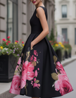 FJØRNA black floral printed midi dress for women, sleeveless with a stylish and elegant design.
