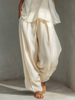 Lightweight summer Tencel wide-leg trousers for women by FJØRNA, featuring a relaxed fit and breathable fabric.