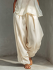 Lightweight summer Tencel wide-leg trousers for women by FJØRNA, featuring a relaxed fit and breathable fabric.