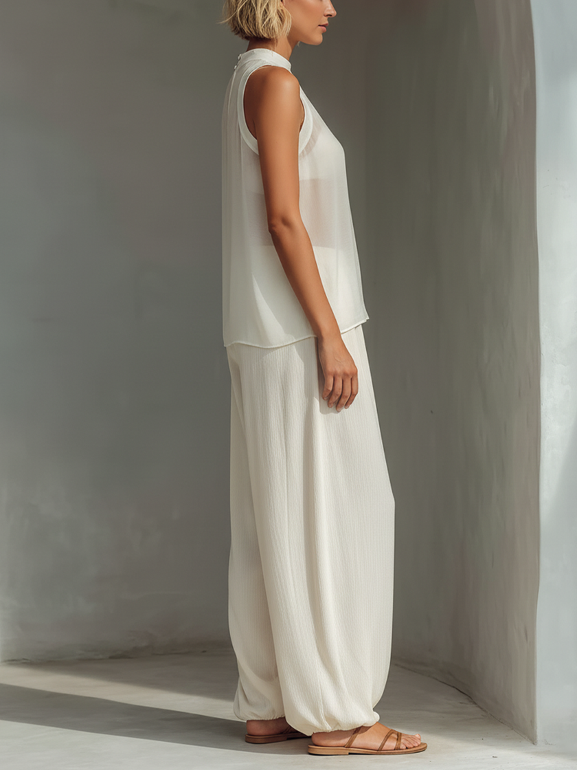 Lightweight women's summer trousers by FJØRNA, Tencel wide-leg trousers with a relaxed fit and breathable fabric for comfort.