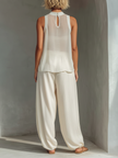 Lightweight summer Tencel wide-leg trousers for women by FJØRNA, shown in soft fabric with a relaxed fit and natural drape.