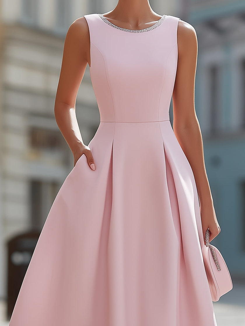 Elegant sleeveless fit and flare midi cocktail dress by FJØRNA with rhinestone neckline, perfect for formal occasions.
