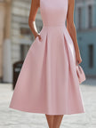 FJØRNA elegant sleeveless cocktail dress with rhinestone neckline, fit and flare midi style, perfect for formal occasions.