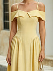 FJØRNA elegant off-the-shoulder midi dress with sweetheart neckline and flared skirt, featuring a sophisticated and feminine design.