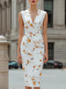 FJØRNA floral print deep V-neck sleeveless bodycon midi dress displayed on a hanger with vibrant flower patterns.