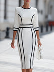 Elegant FJØRNA piping bodycon midi dress with fitted silhouette, detailed piping design, and sleeveless style on model.