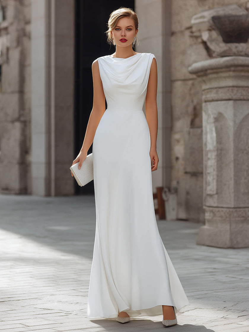 FJØRNA sleeveless draped cowl neck A-line maxi dress with flowing fabric and elegant silhouette, shown on a model.