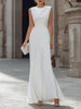 FJØRNA sleeveless draped cowl neck A-line maxi dress with flowing fabric and elegant silhouette, displayed on a hanger.