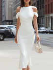 FJØRNA cold-shoulder draped high-neck elegant midi dress displayed on a model, showcasing its sophisticated design and flowing fabric.