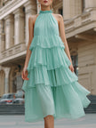 FJØRNA halter neck tiered ruffle flowing midi dress with layered ruffles and a relaxed fit, perfect for summer or casual occasions.