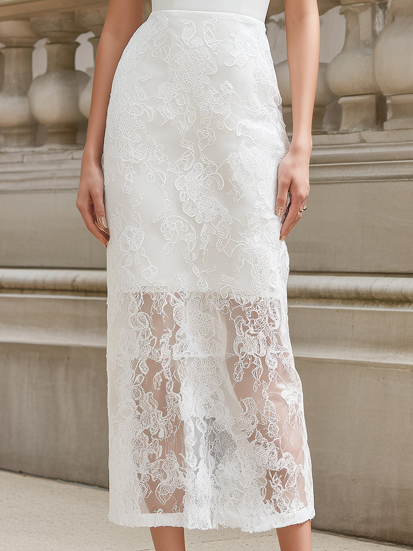 FJØRNA spaghetti strap lace overlay bodycon midi dress displayed on a hanger with intricate lace details and a fitted silhouette.