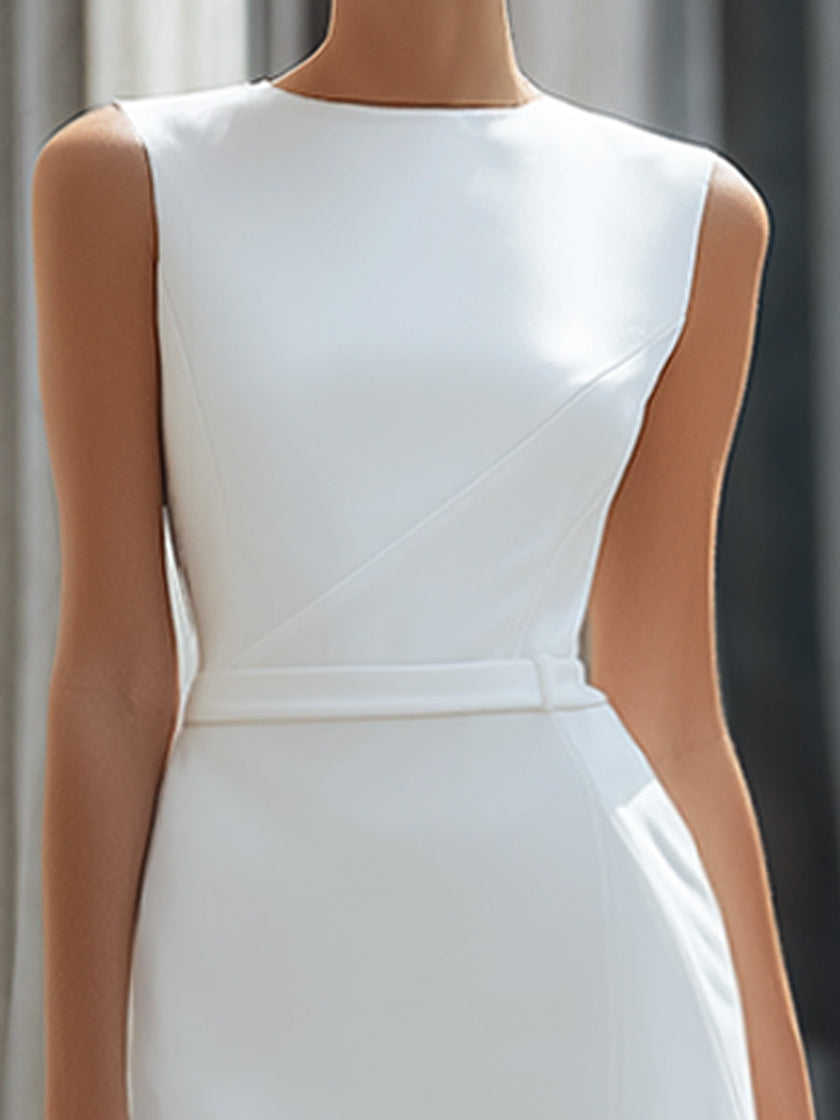 FJØRNA sleeveless asymmetrical panel tailored maxi dress with a flowing design and sleek silhouette, perfect for elegant occasions.