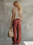 Khaki FJØRNA retro short-sleeve knitted T-shirt for women, close-up of the textured fabric and classic design.