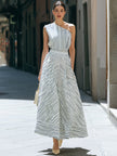 FJØRNA one-shoulder striped pleated midi dress featuring a stylish silhouette and elegant design, perfect for a sophisticated look.