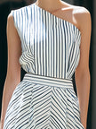 FJØRNA one-shoulder striped pleated midi dress with elegant draping and a fashionable silhouette, perfect for stylish occasions.