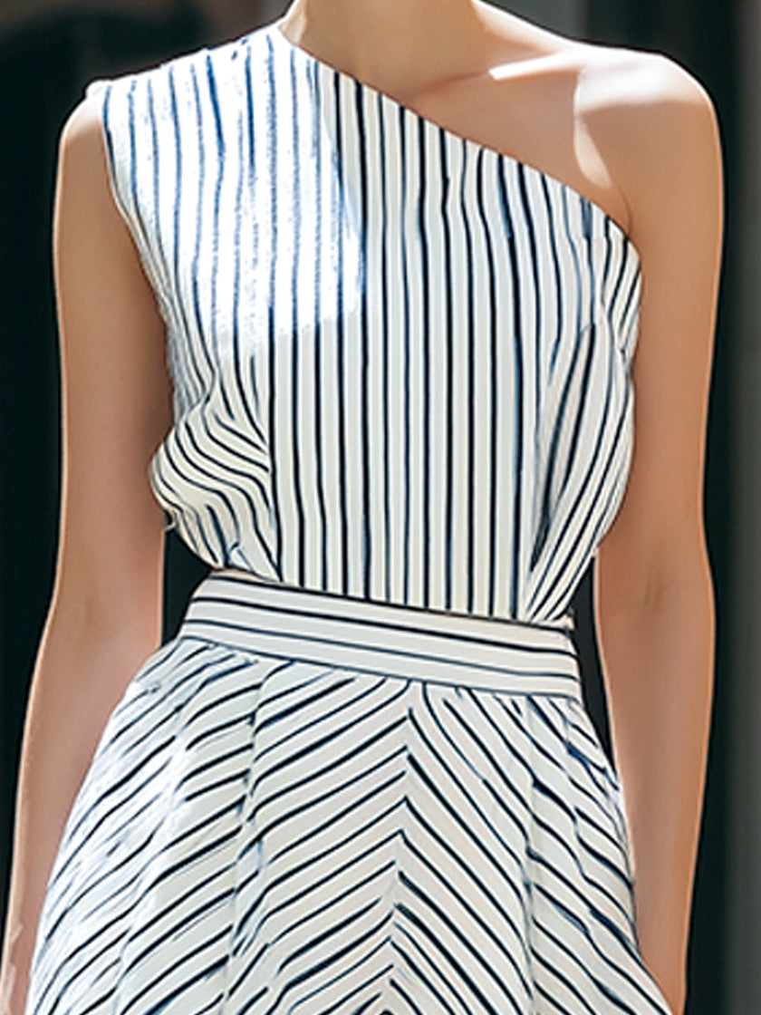 FJØRNA one-shoulder striped pleated midi dress with elegant draping and a fashionable silhouette, perfect for stylish occasions.